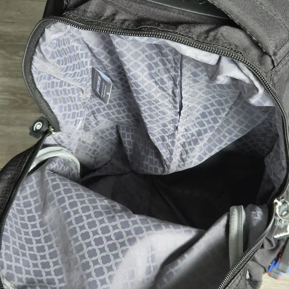 J World New York Sparkle Rolling Backpack Carry-On Luggage Wheels Speed Design